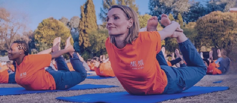 A man practicing yoga in a bright room, symbolizing inner strength and self-discovery for all ages
