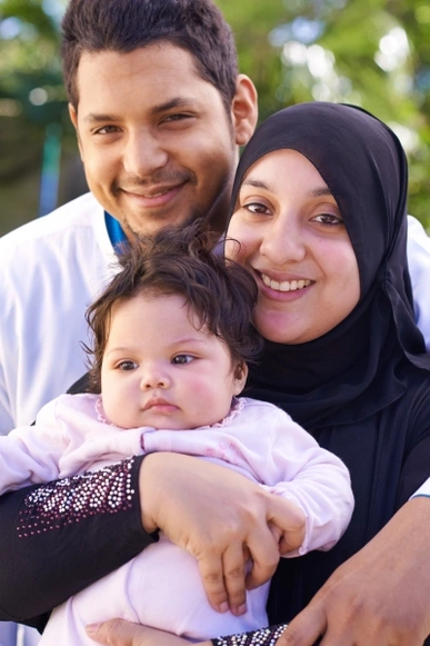 A joyful family of three enjoying quality time, highlighting the importance of bonding