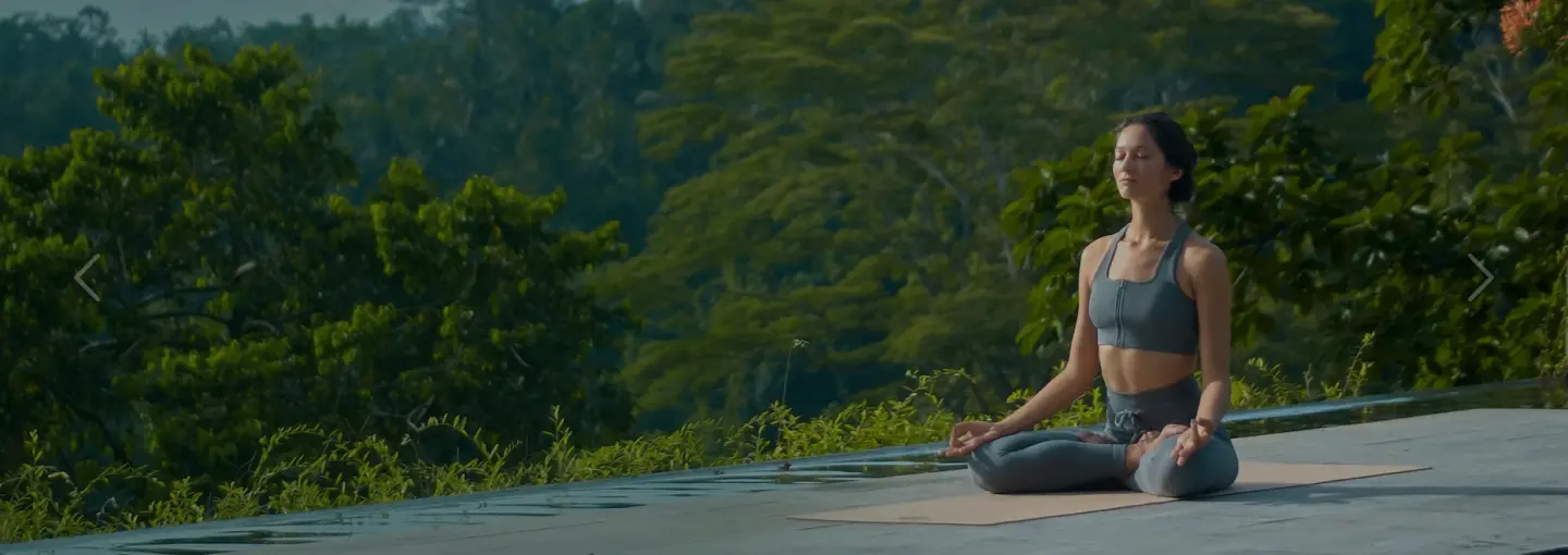 People participating in an Art of Living meditation and wellness program at a local center