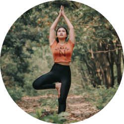 A female performing yoga asana