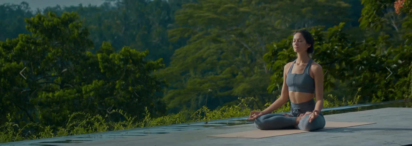 People participating in an Art of Living meditation and wellness program at a local center