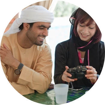 A young boy and girl looking at their camera being confident and building good social skills