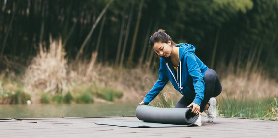 Roll out yoga mat in winter