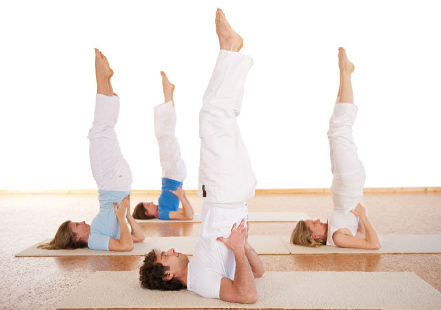 group doing Sarvangasana image