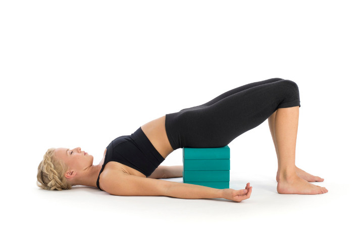 bridge pose with yoga block