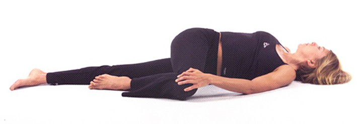 Supine Spinal Twist (Supta Matsyendrasana) | The Art of Living