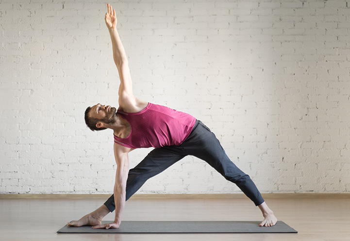 Triangle Pose: Improve Your Balance, Reduce Back Pain Today | The Art of Living
