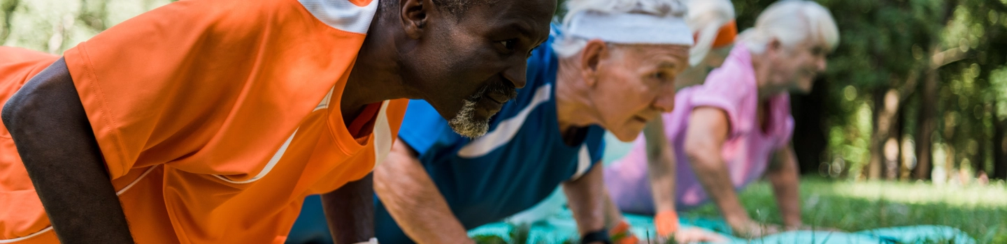 Group of senior people during their participation in art of living's happiness program