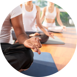 An image showing hands of three people meditating in chin mudra