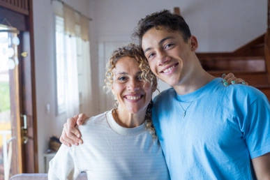Know Your Teen Workshop - Strengthening Parent-Teen Relationships Happy mother and teenage son smiling together, representing trust, family harmony, and emotional connection