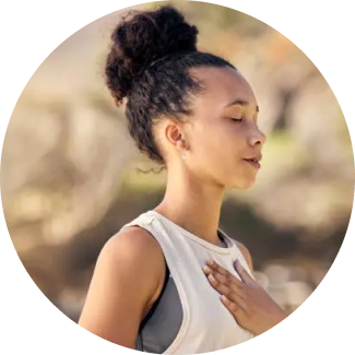 A woman meditating in a tranquil environment, embodying mindfulness and clarity through sanyam