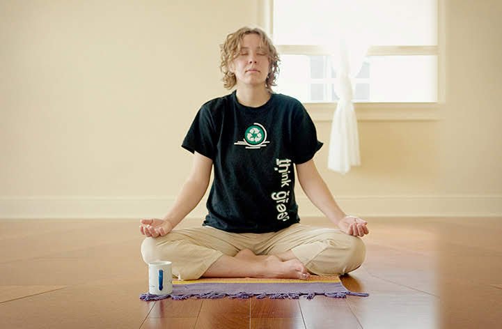 Young woman practicing rhythmic patterns for stress-relief.