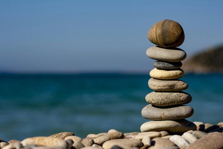 Stacked rocks representing a balanced nervous system, one step at a time.