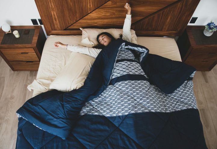 Woman enjoying healthy sleep supporting balance and mental clarity.