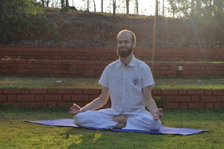 meditating on a yoga mat