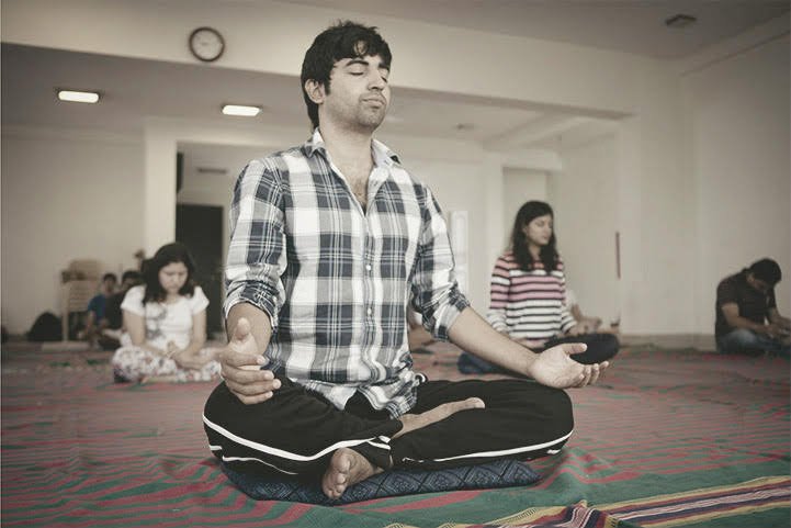 practicing meditation