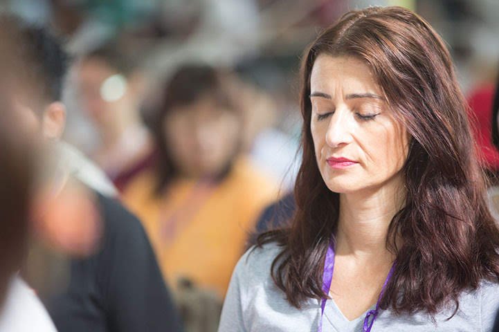 Person practicing SKY Breath Meditation to reduce health anxiety