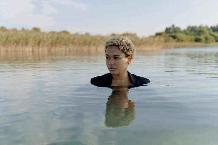 women-partially-submersed-in-water-experiencing-poor-mental-health