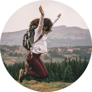 A man jumps high against a starry night, representing the courage to overcome limitations and discover his full potential.