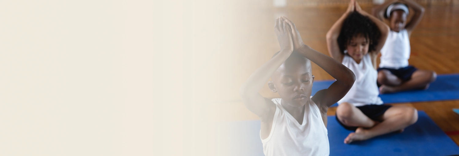 Group of young boys practicing yoga in a yoga session