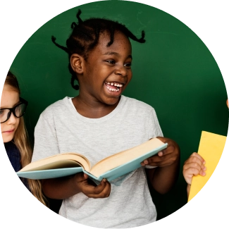 Teacher guiding four attentive children at a table, emphasizing life skills through ART Excel.